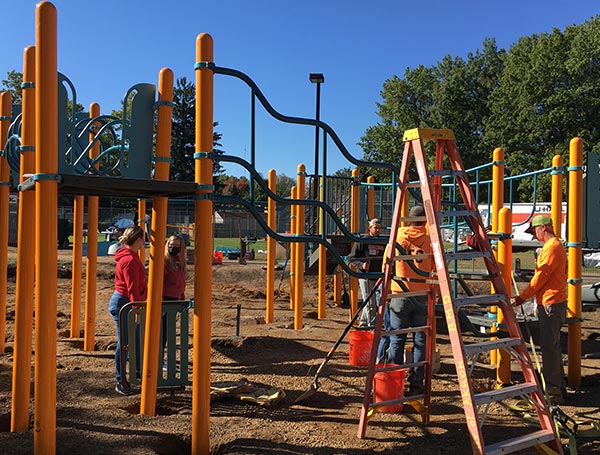 people building playground