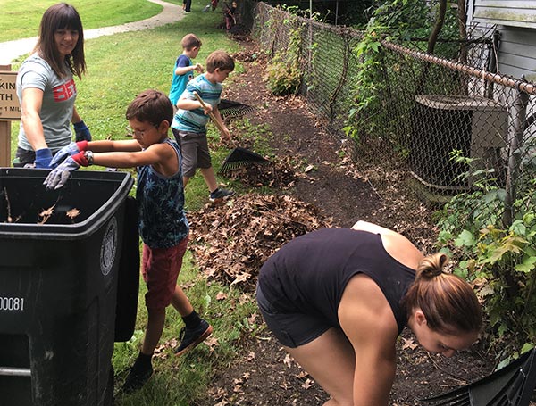 kids cleaning up leaves